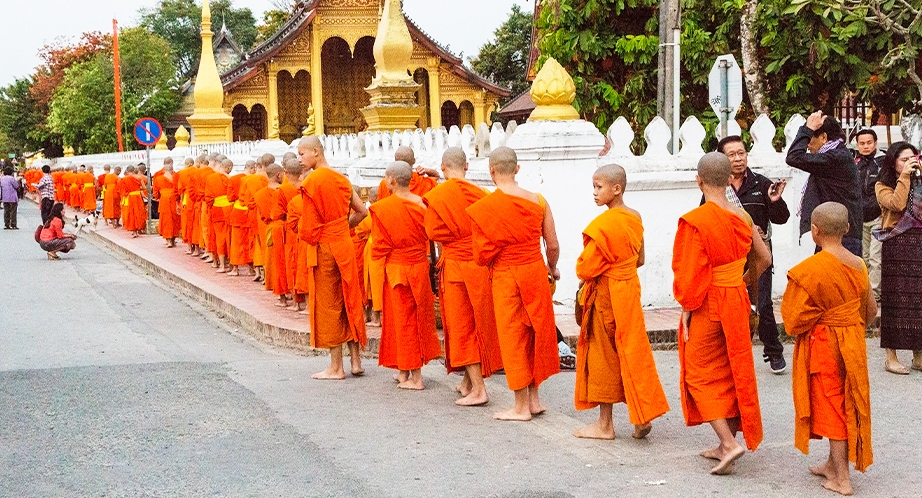 Laos monks goes begging for alms