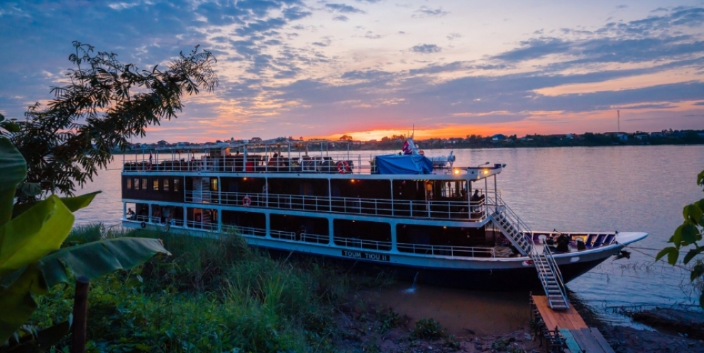 Explore Mekong River at night with Toum Tiou 2 boat