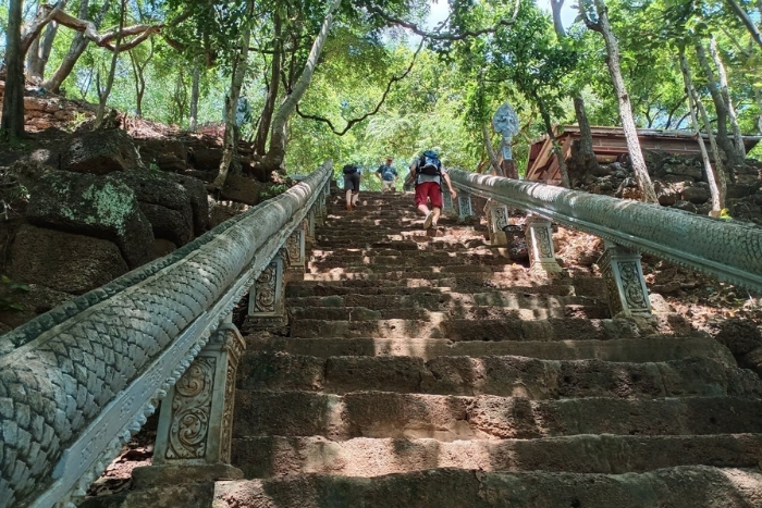 Trekking in Battambang by climbing the 358 steps to the summit