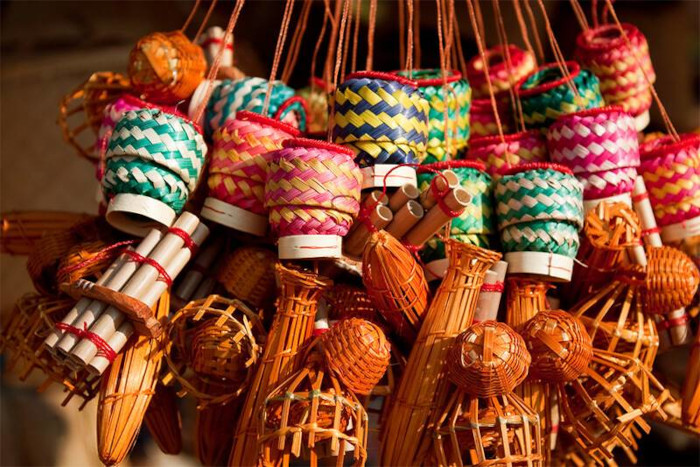 Charming wooden crafts at Vientiane night market—perfect Laos souvenirs to take home a piece of tradition