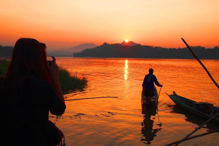 Watching the sunset from Bamboo Tree Bar, the perfect spot to unwind during my Luang Prabang itinerary 2 days