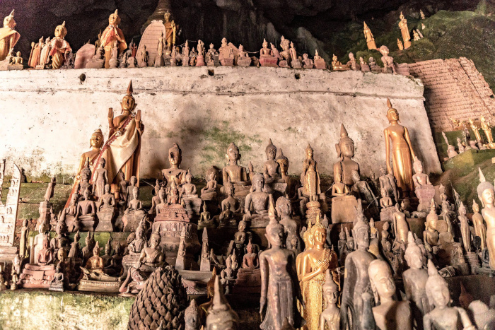 "Explore the mystical Pak Ou Cave, a gem on your Laos itinerary 2 weeks