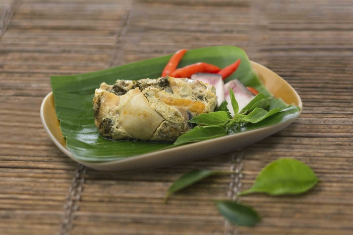 Mok Pa Champasak (Steamed fish in banana leaves)