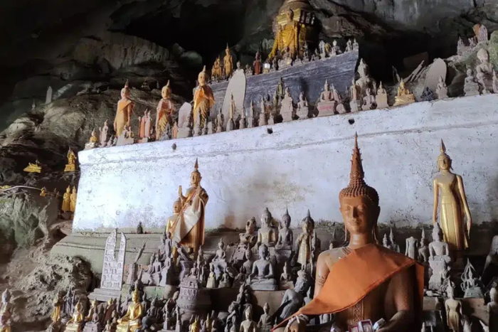 Admire the majestic beauty inside Pak Ou Cave with thousands of Buddha statues