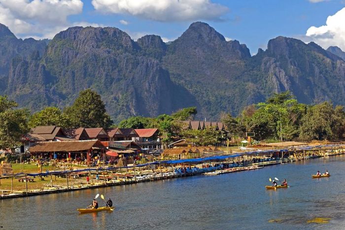 What to do in Laos in August? Kayaking on the Nam Song River