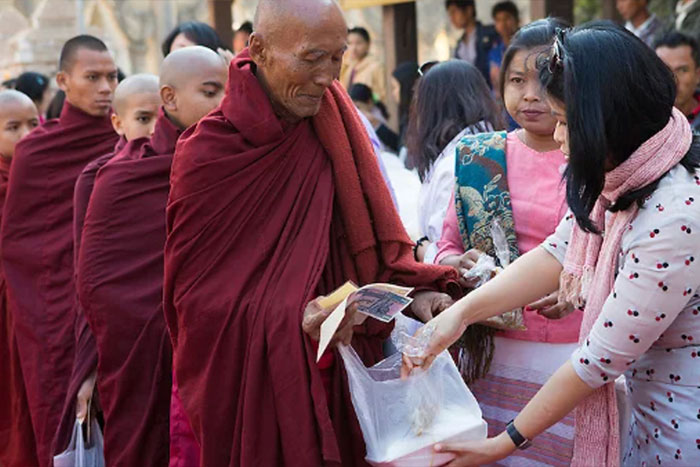 Red robed monks in Ananda Temple Festival