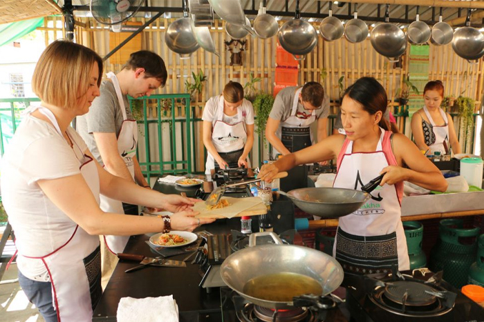 Participate in a Thai cooking class during rainy days in Chiang Rai