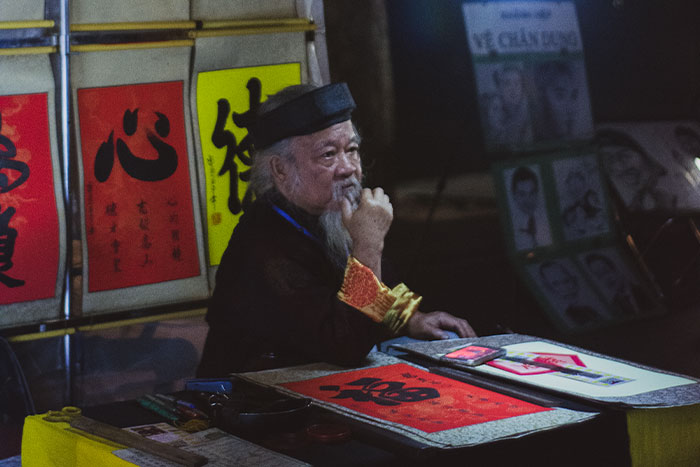 Traditional caligraphy on Hoan Kiem walking street.