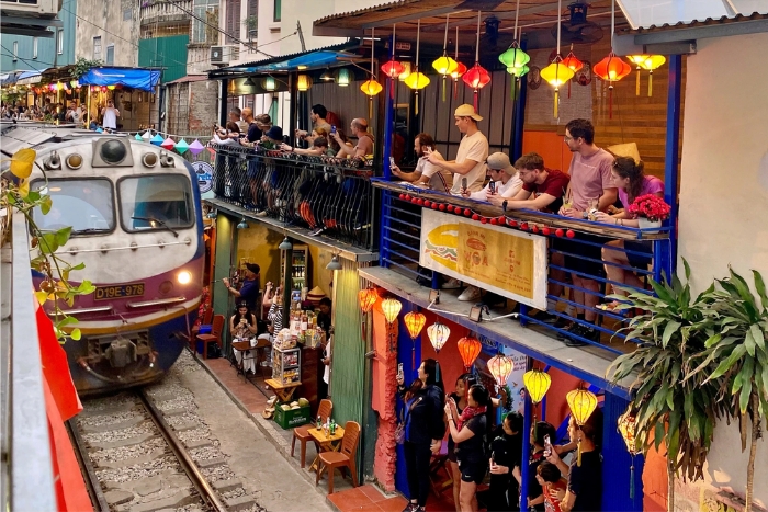 Lively ambiance of train street in Hanoi 