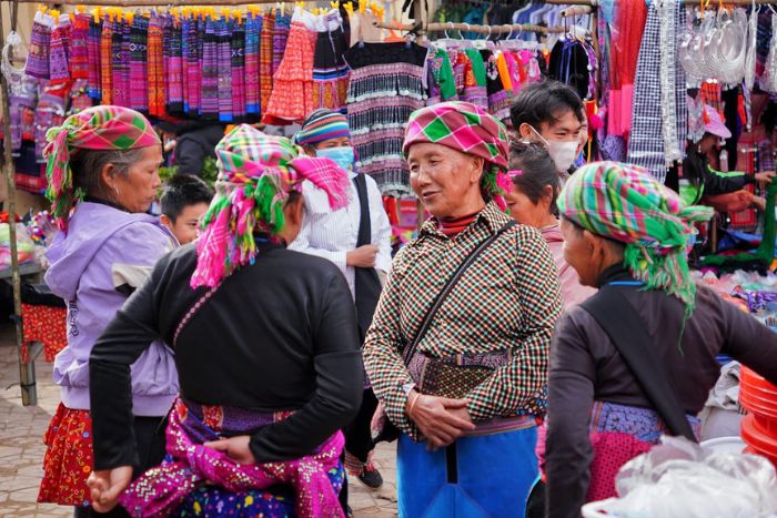 People were chatting after buying stuff at the Y Ty Saturday market