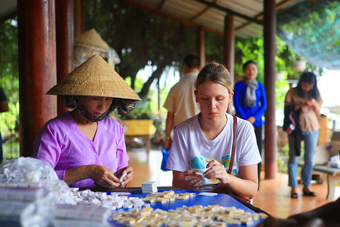 Participating in craft activities in Cai Be