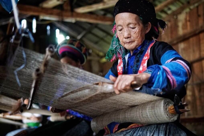 The bright colors come from the linen weaving village of Lung Tam