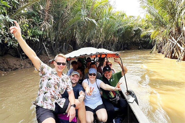 Take a boat trip along Mekong river 