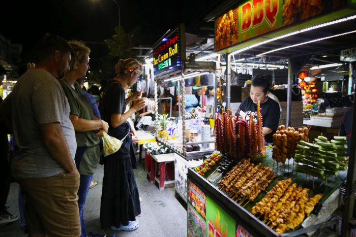 Many street food stalls along the river