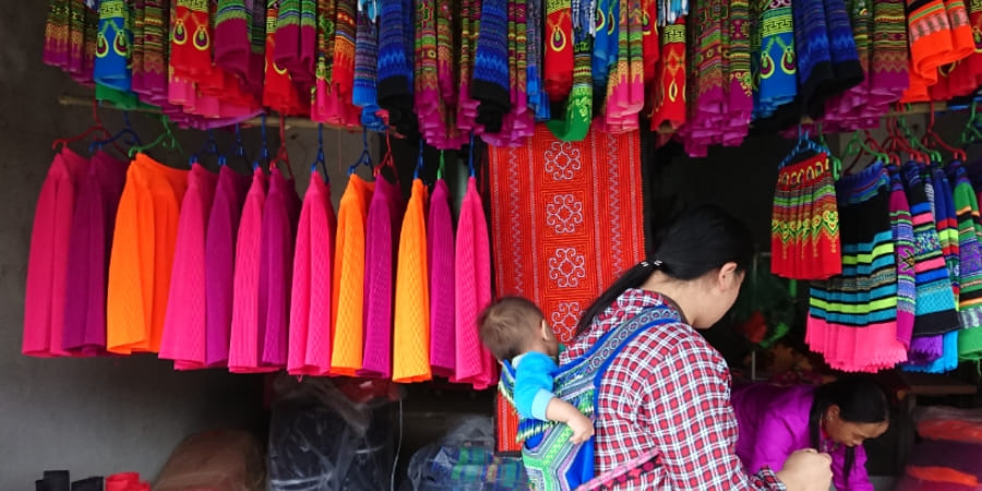 A stall selling brocade at the Weekly Market in Mai Chau