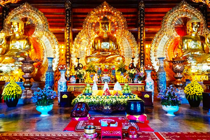 Three bronze statues of Tam The Buddha in Bai Dinh Pagoda