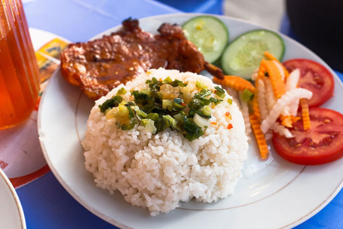 Try “com tam” (broken rice) at Ben Thanh Market