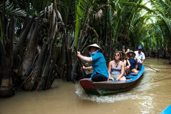 Using Vietnam transportation by boat in the Mekong Delta offers a unique way to explore this captivating region