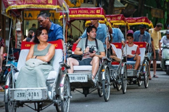 Using a cyclo in Vietnam is an ideal transportation option for family travel in this country