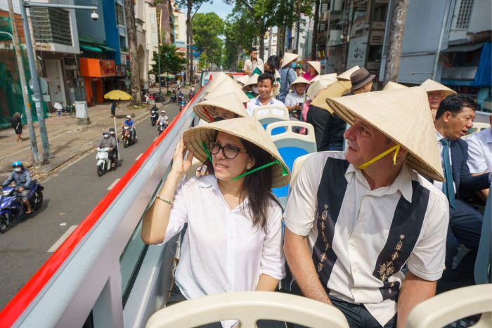 Tourists enjoy the sunny weather of Ho Chi Minh City to explore the city