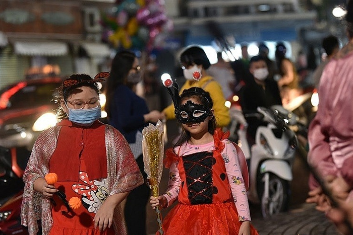 People of all ages in Vietnam participate in Halloween activities