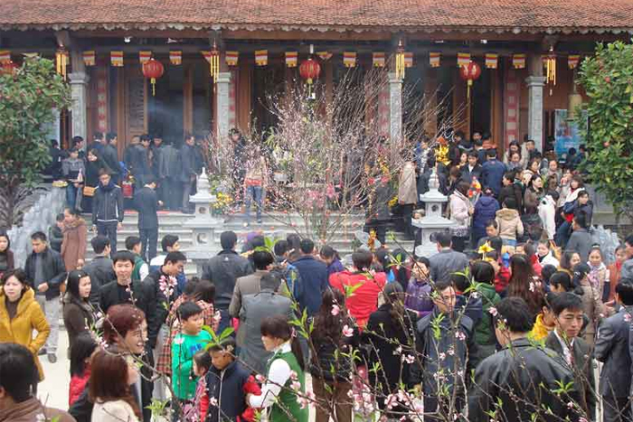 Vietnamese people visit temples on New Year's 